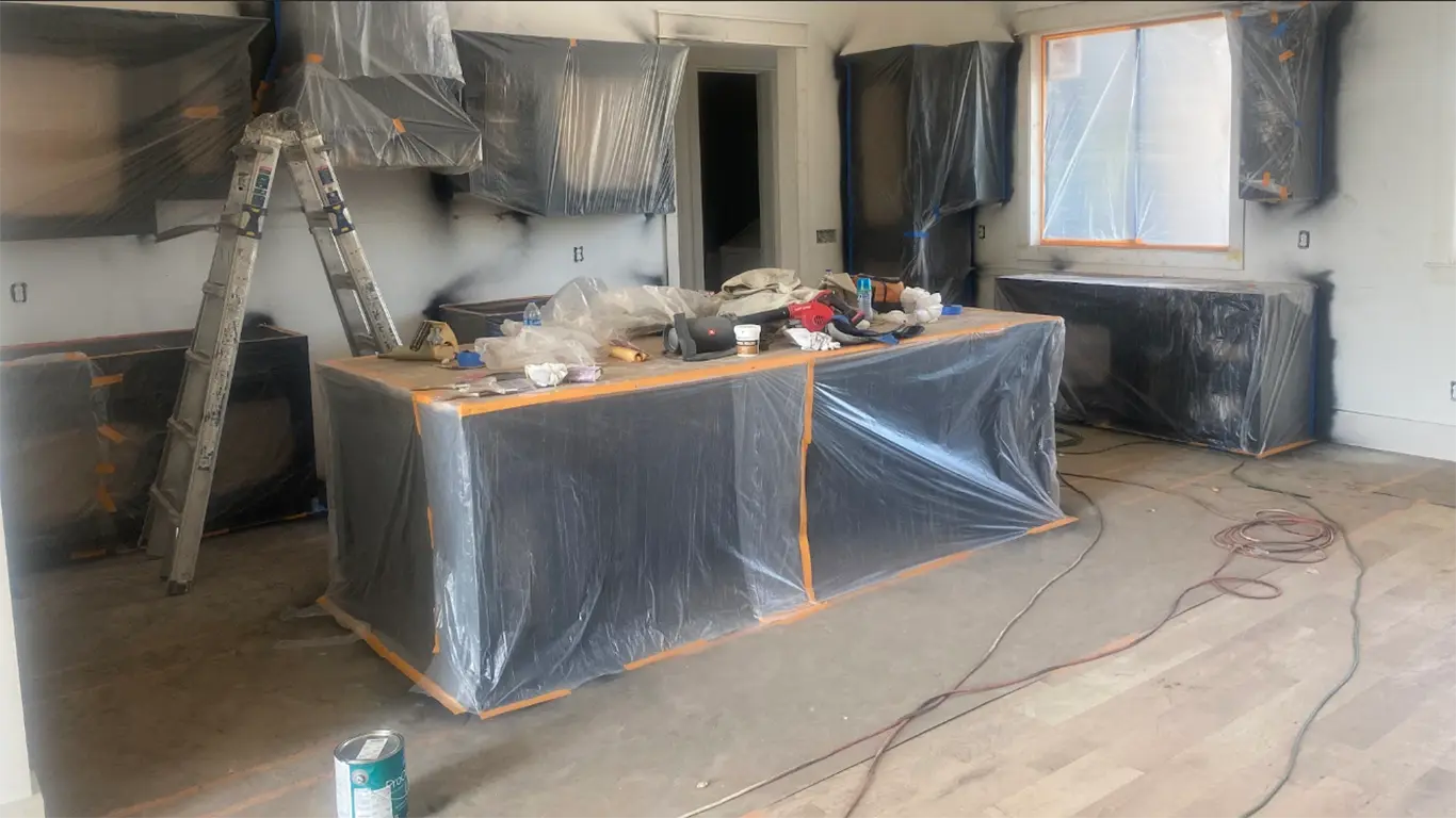 Kitchen carefully prepped before being painted